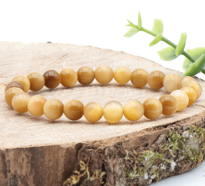 Bracelet boule oeil de tigre doré AA